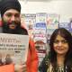 New managers of Portland Newsagency, Simrinjeet Singh and Sara Marriner with a print edition of the Lithgow Mercury. Picture by Reidun Berntsen. 