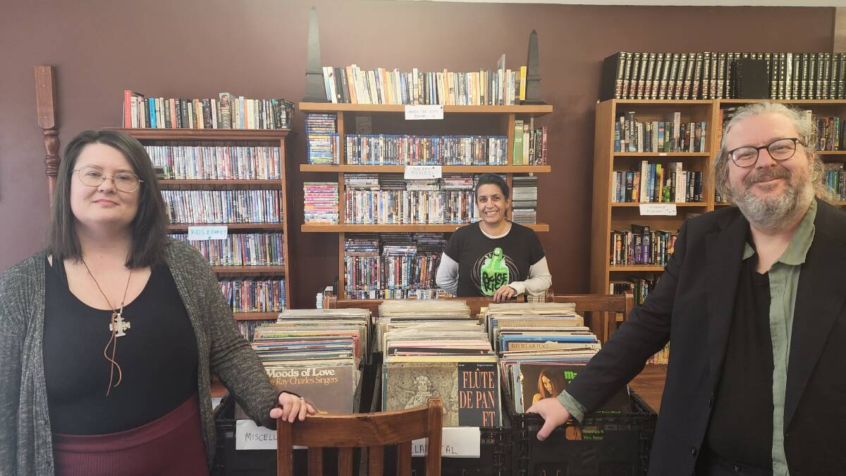 Jasmine, Aaron Thorne and their friend Vicki stand with some of the stores vinyl collection, which is proving to be popular with locals. Picture by Reidun Berntsen. 