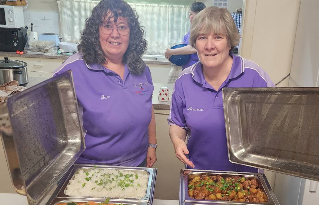 Sue Murdoch and Leanne Walding serve up a delicious meal at the Nanna's Touch soup kitchen. Picture by Reidun Berntsen.