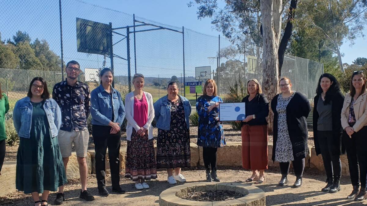 Staff at Wallerawang Public School with the award. Picture supplied. 