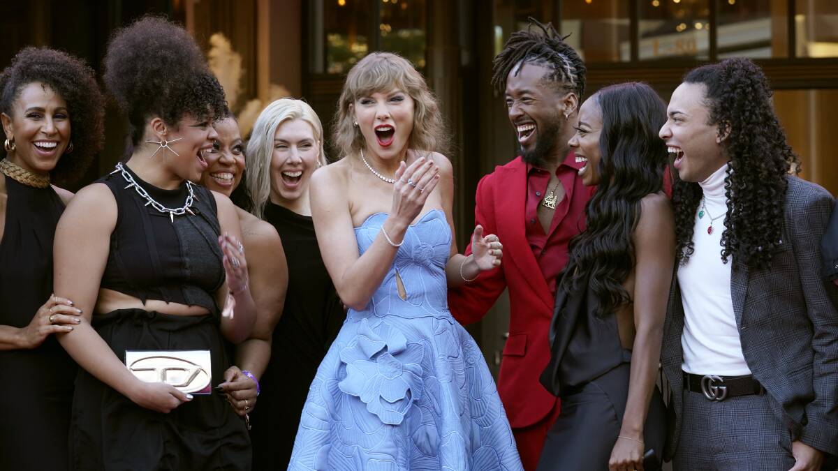 Taylor Swift, center, and tour dancers arrive at the world premiere of "Taylor Swift: The Eras Tour". Picture by AP Photo/Chris Pizzello
