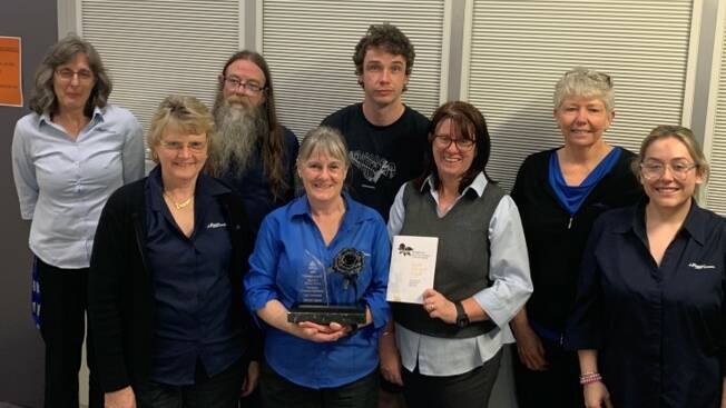 Lithgow Library staff with Black Rose trophy, (left to right back row Elizabeth Peters, Bruce Royall, Joel Brogan, Scotia Tracey, front row Cathy Manfredotti, Sharon Lewis, Michelle Lane, Gemma Pillans. Photo: Supplied