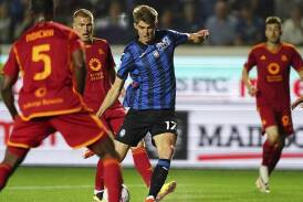 Atalanta's Charles De Ketelaere scores in his team 2-1 win over Roma in Serie A. (AP PHOTO)